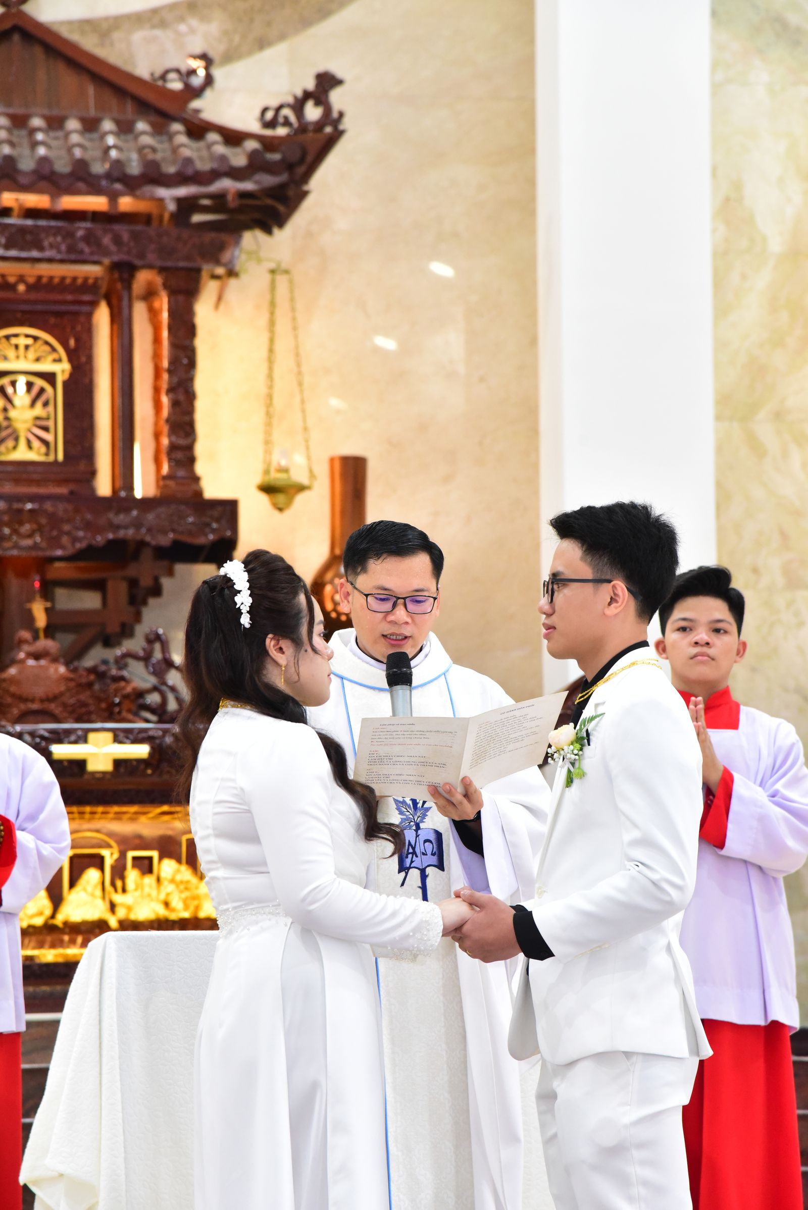 Couple exchanging vows during a religious ceremony